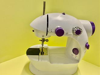 Click image for larger version  Name:	plastic sewing machine.jpg Views:	0 Size:	104.2 KB ID:	22579